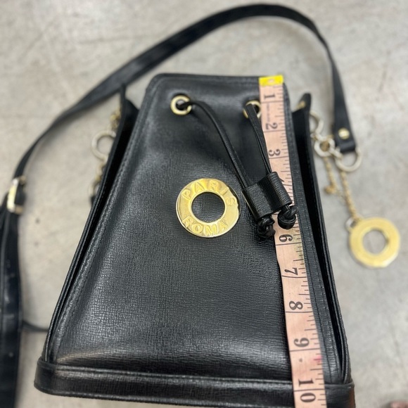 Small Black Crossbody Bag with Gold Accents and Drawstring Closure - Picture 6 of 13